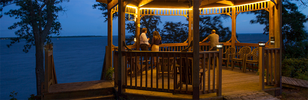 People in a Gazebo at Sunset