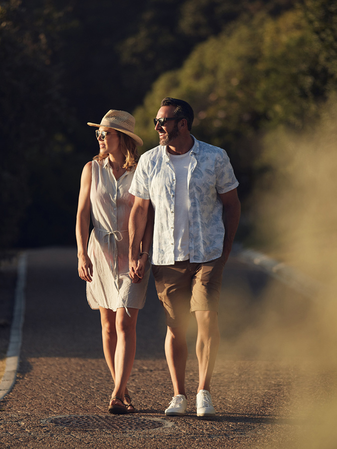 Senior Couple Walking on Trail