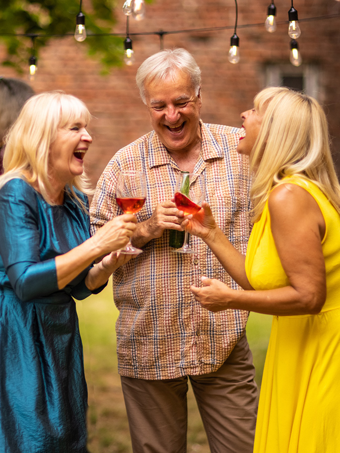 Seniors Laughing and Enjoying Community LIving